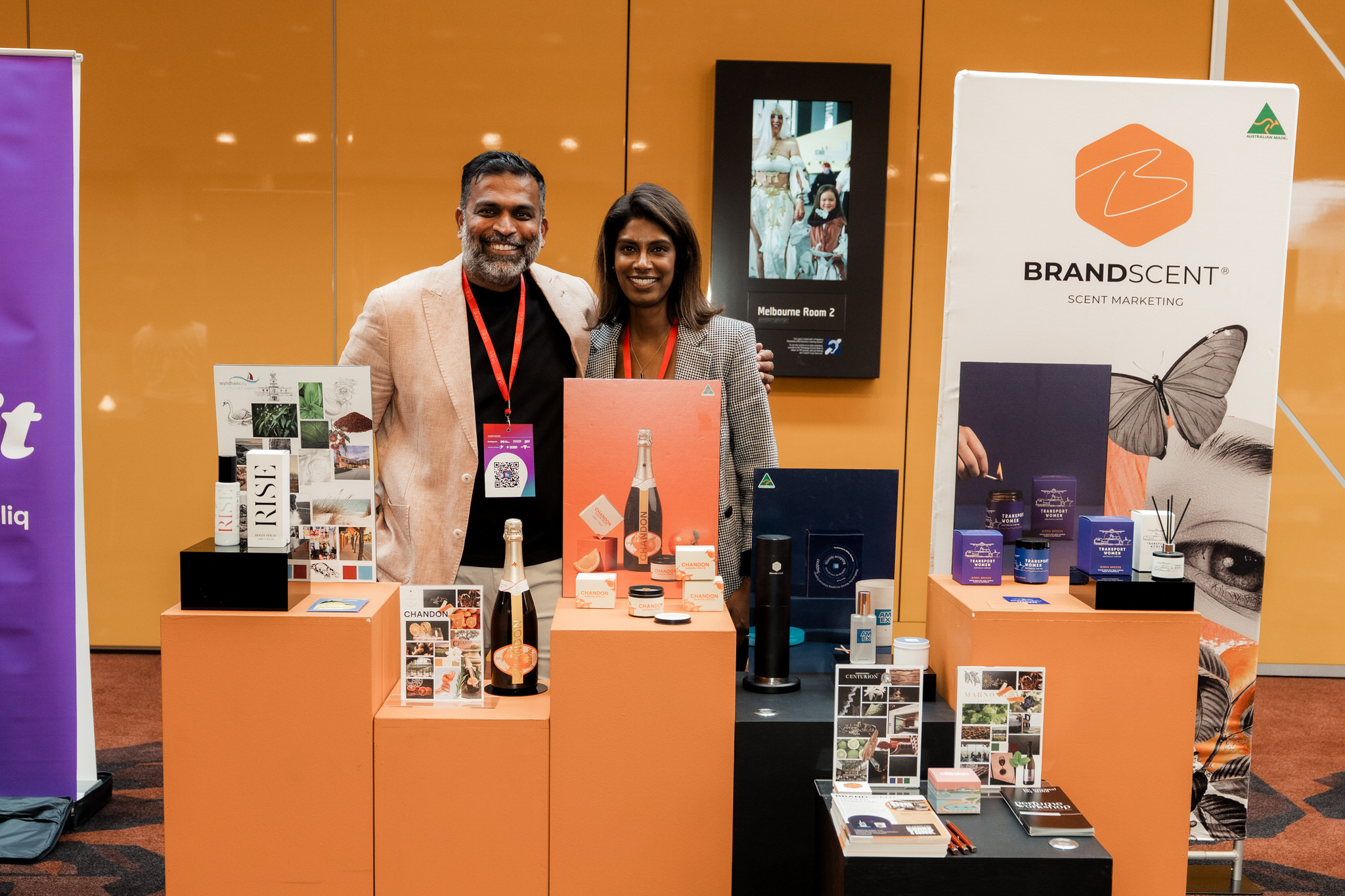 Light & Glo founders at a BrandScent scent marketing exhibition booth, showcasing customised fragrance products for brand experiences and corporate gifting.